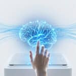 A hand touches a glowing blue AI brain on a minimalist digital interface, surrounded by ethereal data streams.